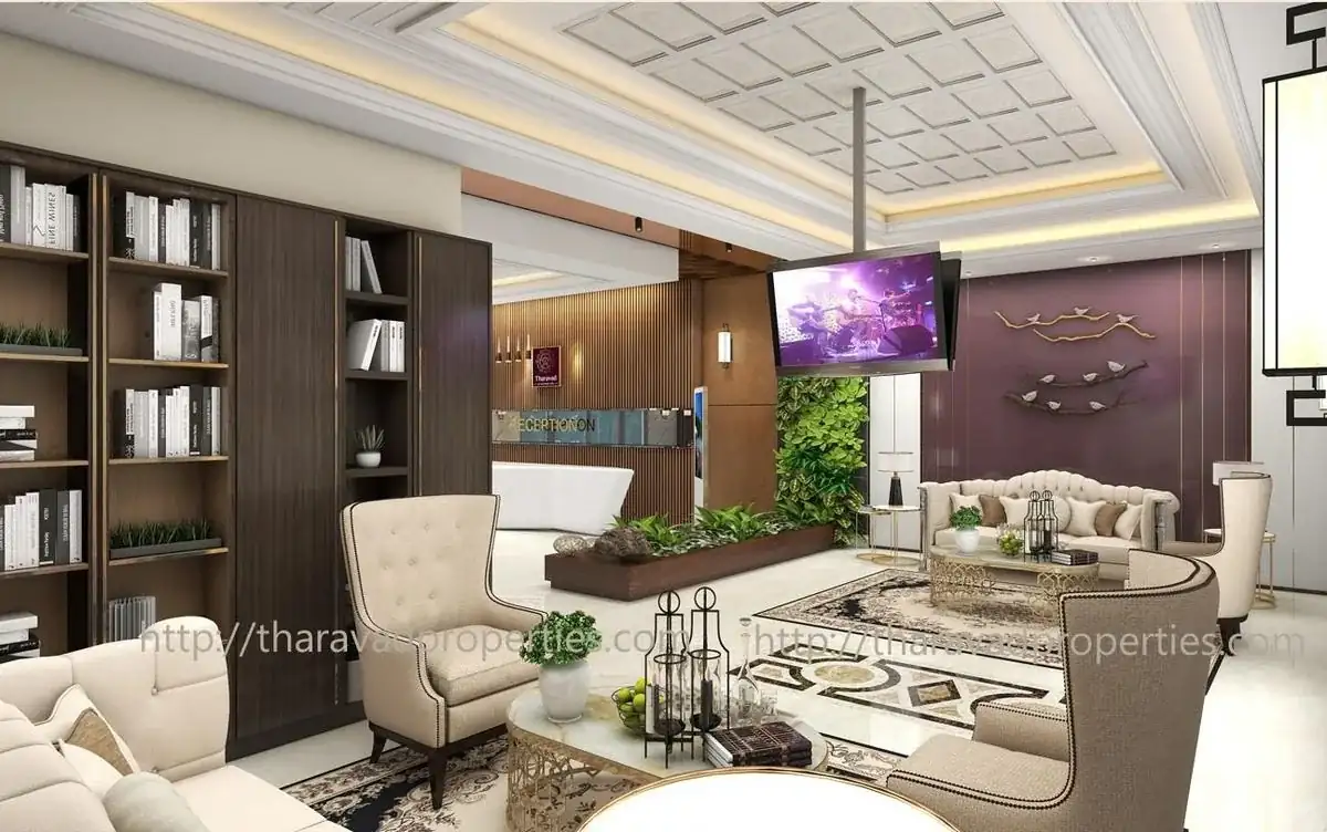 Lounge with bookshelves and wing chairs
